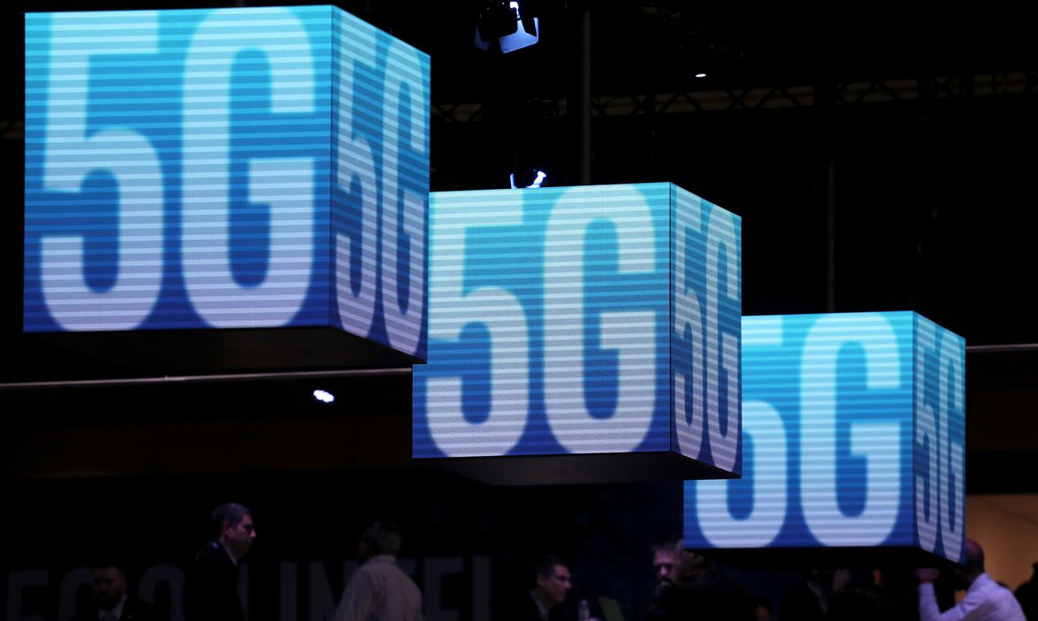 FILE PHOTO: Hanging cubes display 5G logos at the Mobile World Congress in Barcelona, Spain, February 26, 2019. REUTERS/Sergio Perez/File Photo